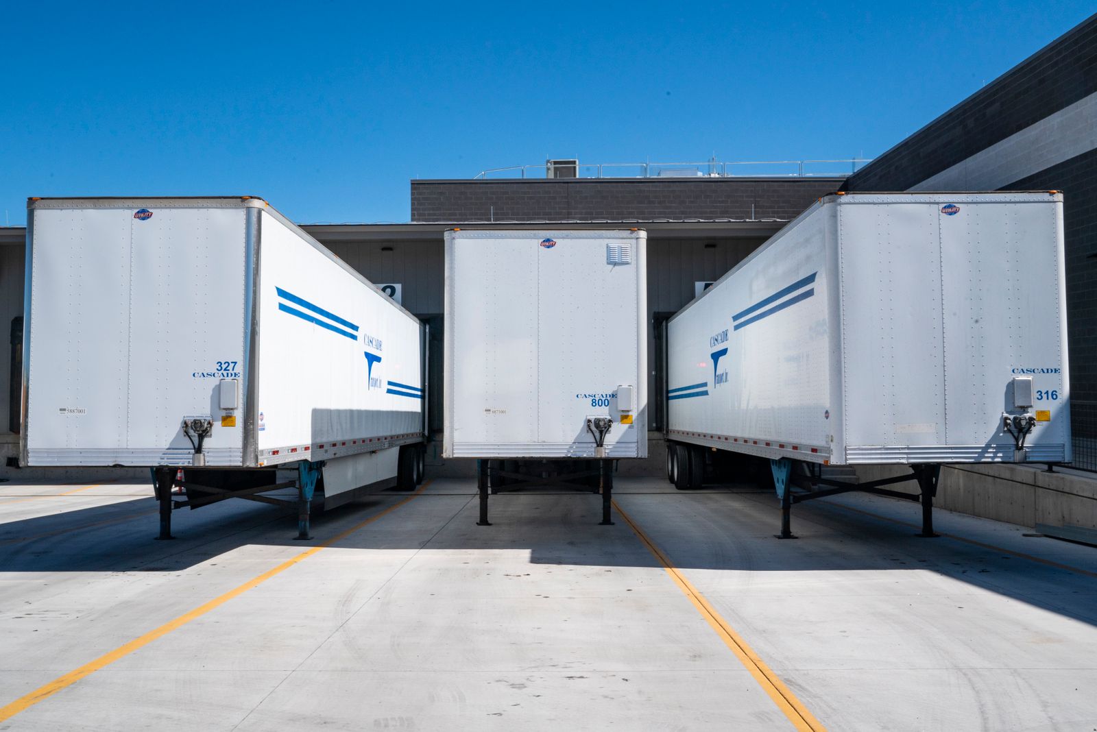 Cargo trailers lined up at a shipping dock