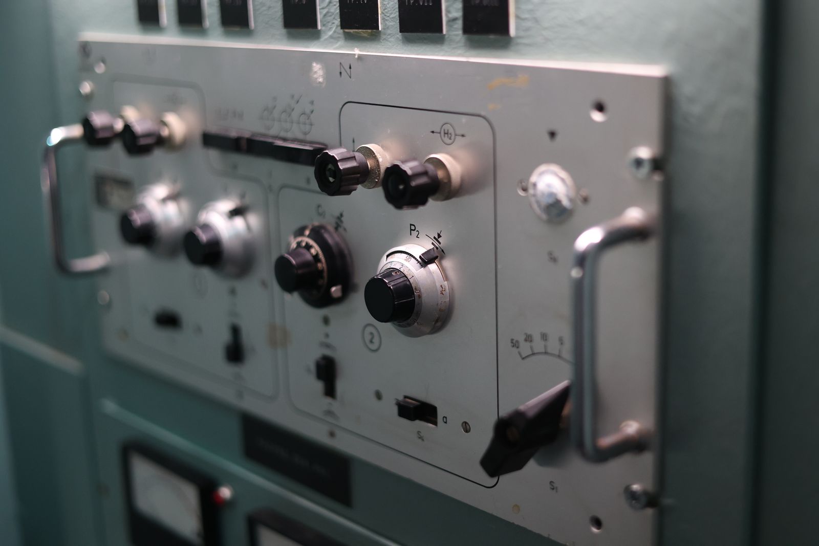 Switches and dials on an industrial control panel