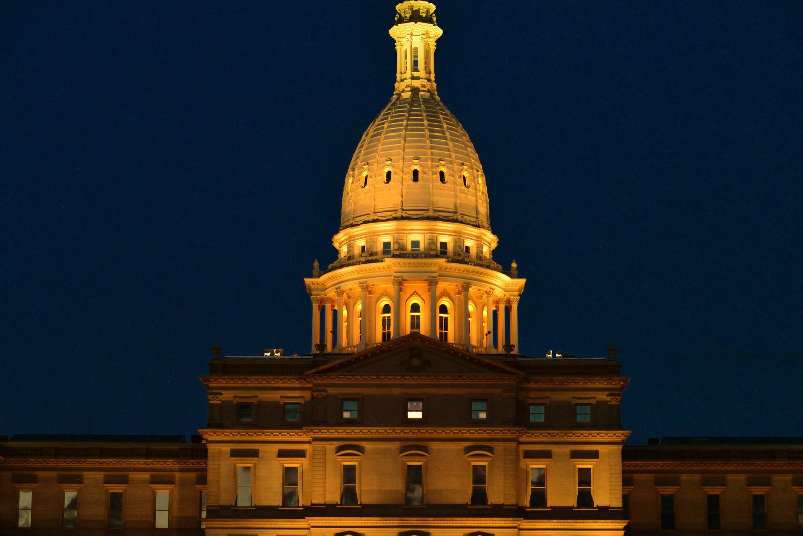 The Michigan State Capitol in Lansing lit at night