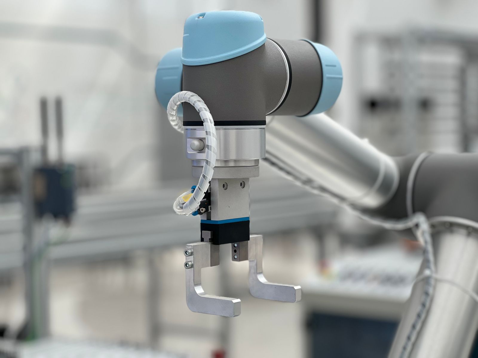 Close up of a robotic arm on a production line