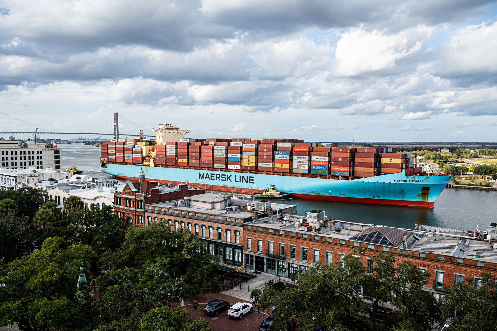 A container ship moving up the Savannah River toward the Garden City Terminal