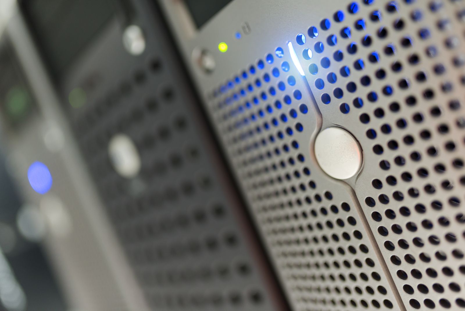 A server rack with blue indicator lights
