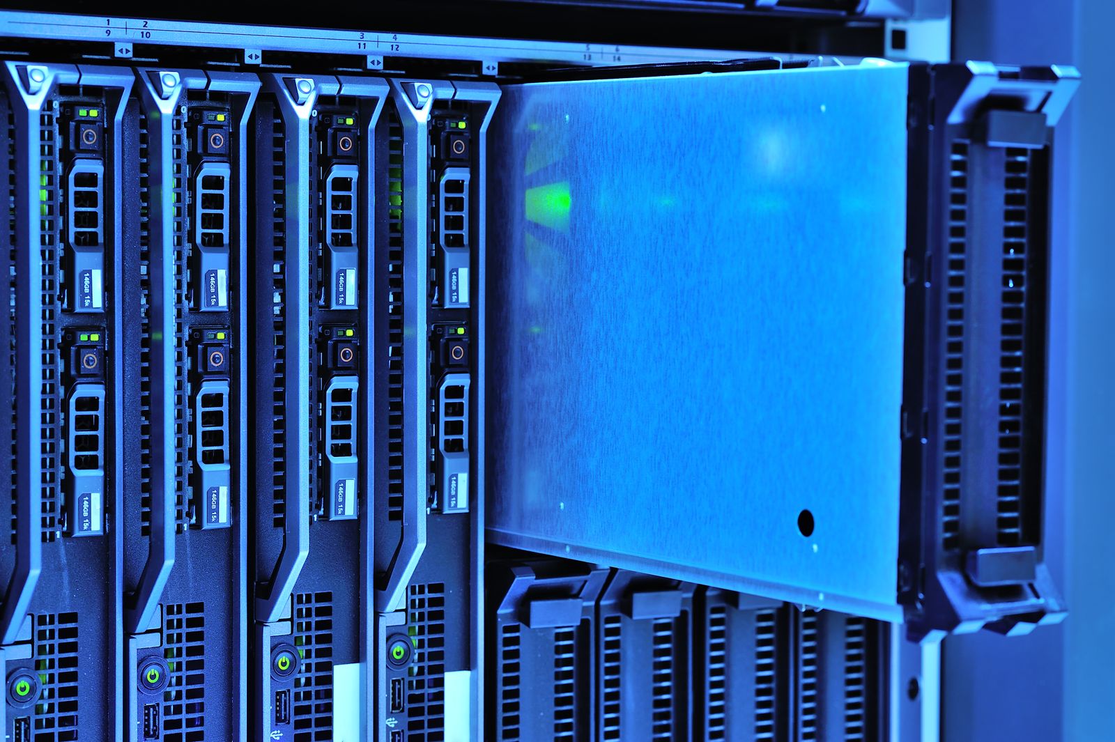 Server racks with glowing lights inside a data center